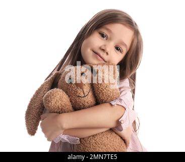 Ritratto di carina bambina con coniglio giocattolo su sfondo bianco Foto Stock