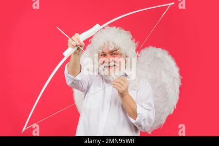 San Valentino cupido. Angelo uomo in ali bianche con arco e frecce. Concetto di amore. Foto Stock