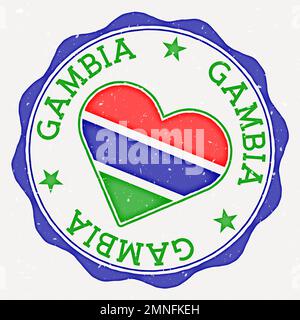 Logo della bandiera Gambia Heart. Testo del nome del paese intorno alla bandiera Gambia a forma di cuore. Affascinante illustrazione vettoriale. Illustrazione Vettoriale