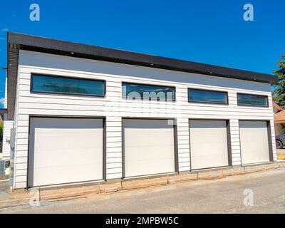 Quattro stalla garage di una casa residenziale in costruzione Foto Stock