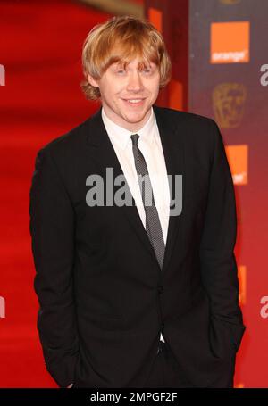 Rupert Grint si pone per i fotografi sul tappeto rosso ai British Academy Film Awards 2011ange che si tengono presso la Royal Opera House di Covent Garden. Londra, Regno Unito. 02/13/11. Foto Stock