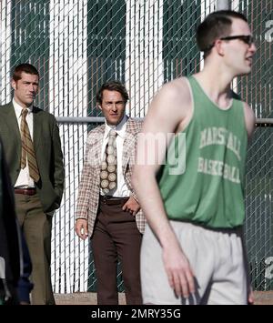 Exclusive!! Actors Matthew Fox, second from left, and Matthew McConaughey, second from right, portray former Marshall coaches Red Dawson and Jack Lengyel respectively and Marshall basketball players LaVar Carter, left, and Mark Patton, right, portray 1971 Marshall basketball players during filming of 'We Are Marshall' on Tuesday, April 4, 2006, near Twin Towers on Marshall's campus in Huntington, W.Va. Stock Photo