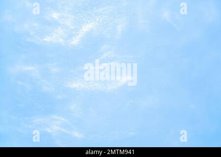 delicato sfondo blu con sequine onde movimento liquido Foto Stock