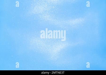 delicato sfondo blu con sequine onde movimento liquido Foto Stock