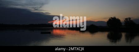 Tramonto sul lago Pfaffikon, Zurigo. Foto Stock