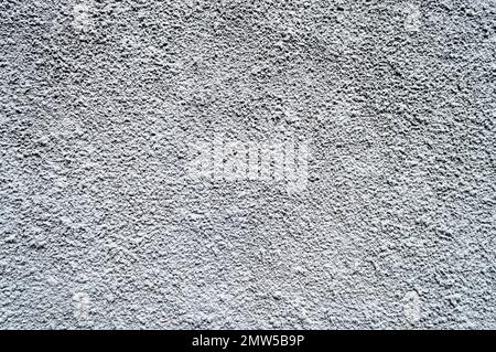 Bella parete grigio chiaro e intonacata a righe. Foto Stock