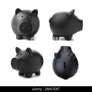 Set con piggy bank nero su sfondo bianco Foto Stock