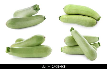 Set di zucchine fresche mature su sfondo bianco Foto Stock