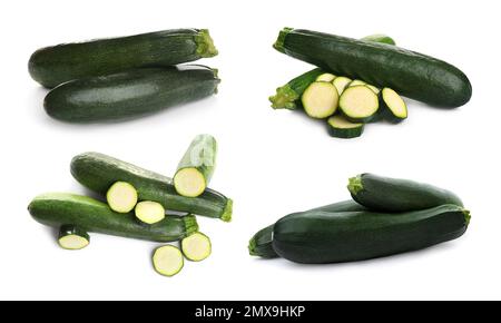 Set di zucchine fresche mature su sfondo bianco Foto Stock