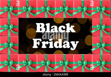 Black Friday. Parole e molte scatole regalo sullo sfondo Foto Stock