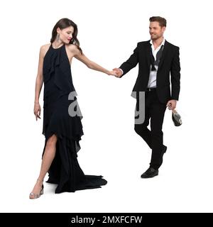 Donna elegante e un bell'uomo che porta una bottiglia di champagne a portata di mano Foto Stock