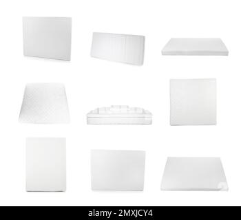 Allestito con moderni e confortevoli materassi su sfondo bianco Foto Stock
