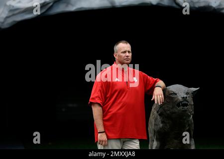 North Carolina State head coach Dave Doeren waits to have his photo taken during the NCAA college football team's media day in Raleigh, N.C., Sunday, Aug. 7, 2016. N.C. State looks to move on from its loss at East Carolina on Saturday night, Sept. 17 when Old Dominion visits. (AP Photo/Gerry Broome)