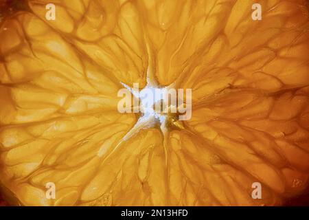 Primo piano di tangerini mature dolci a fette, foto macro Foto Stock