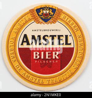 Montagne russe vintage in cartone con birra Amstel con logo. Amstel è un'azienda olandese di produzione di birra. Fondata il 11 giugno 1870 ad Amsterdam, prende il nome dal fiume Amstel. Foto Stock