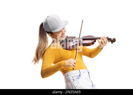 Giovane violinista femminile allegra che suona un violino isolato su sfondo bianco Foto Stock