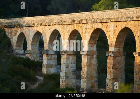 Old, Roman aqueduct, the Ferreres Aqueduct (Aqüeducte de les Ferreres) also known as Pont del Diable (Devil's Bridge) near Tarragona Stock Photo