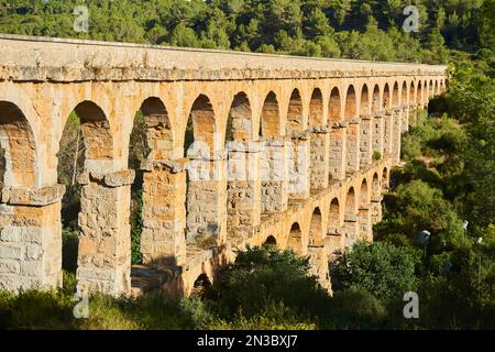 Old, Roman aqueduct, the Ferreres Aqueduct (Aqüeducte de les Ferreres) also known as Pont del Diable (Devil's Bridge) near Tarragona Stock Photo