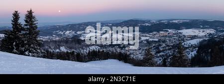 Panorama of historical mining town Banska Stiavnica at dusk, UNESCO site, Slovakia Foto Stock