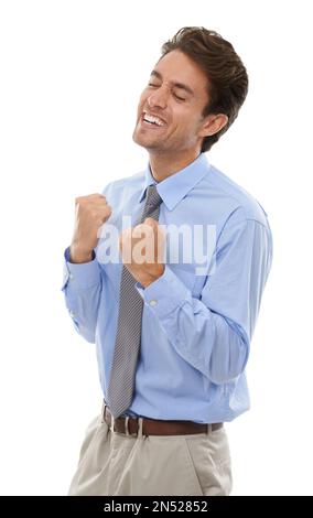 Il successo aziendale. Studio shot di un giovane uomo d'affari eccitato isolato su bianco. Foto Stock