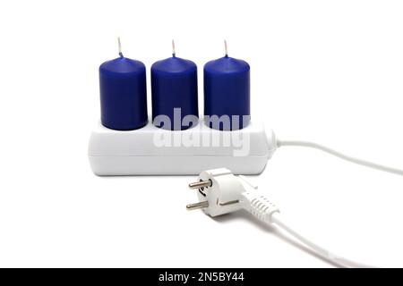 presa di corrente con candele per risparmiare energia Foto Stock