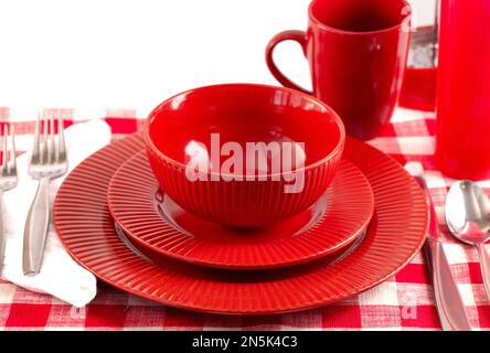 Tavolo con un Gingham Place Mat impostato per un pasto Foto Stock