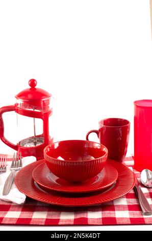 Tavolo con un Gingham Place Mat impostato per un pasto Foto Stock