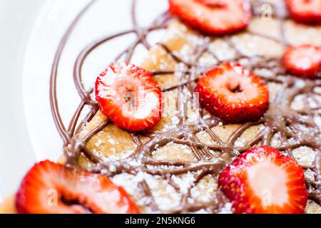 Una cialda, citata anche con le parole straniere cialda, cialda, cialda o cialda, è una tipica colazione belga e francese del nord. Foto Stock