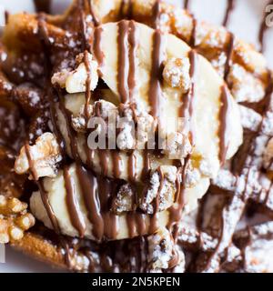 Una cialda, citata anche con le parole straniere cialda, cialda, cialda o cialda, è una tipica colazione belga e francese del nord. Foto Stock