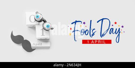 Decorazioni per feste e calendario su sfondo chiaro. Aprile Fools Day Foto Stock