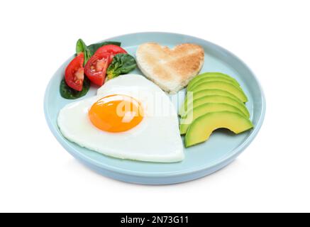 Colazione romantica con uova fritte a forma di cuore, avocado e toast isolato su bianco. Festa di San Valentino Foto Stock