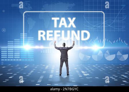Uomo d'affari nel concetto di rimborso fiscale Foto Stock