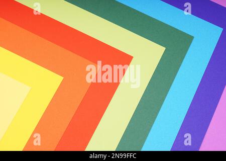 sfondo di carta color arcobaleno con motivo angolare colorato Foto Stock