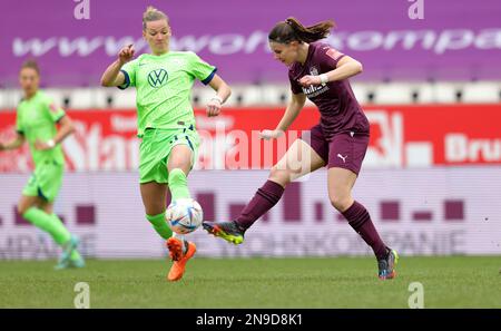 Eat, Deutschland. 12th Feb, 2023. firo : 02/12/2023 calcio, 1st campionato, 1st campionato federale, stagione 2022/2023, Flyer allarme lega federale delle donne SG Essen-Schonebeck - VfL Wolfsburg duelli da sinistra a destra: Alexandra Popp contro Katharina Piljic Credit: dpa/Alamy Live News Foto Stock