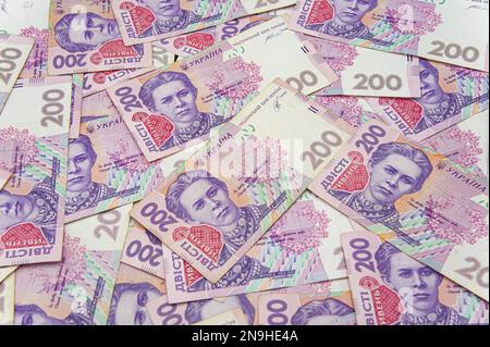 Sfondo di denaro ucraino. banconote con un valore nominale di 200 hryvnia sfondo denaro. Denaro ucraino. Concetto aziendale. Sfondo con hryvnia. P Foto Stock