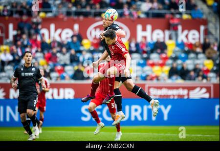 Duesseldorf, Germania. 12th Feb, 2023. Aleksandr Zhirov (SVS), Shinta Appelkamp (F95) Fortuna Düsseldorf - SV Sandhausen Bundesliga 12.02.2023 Copyr Foto Stock