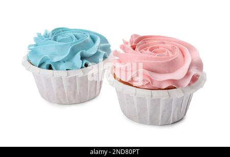 Cupcake per doccia con crema rosa e azzurro su sfondo bianco Foto Stock