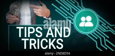 Suggerimenti e trucchi per la visualizzazione concettuale. Parola scritta su consigli utili che rende determinate azioni più facili da fare Foto Stock