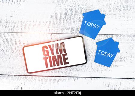 Segno di scrittura a mano Gym Time. Parola per una motivazione per cominciare ad esercitarsi fuori fare le esercitazioni idoneità Foto Stock