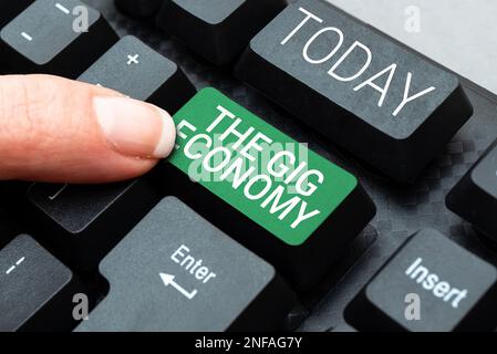 Testo a mano The Gig Economy, foto concettuale mercato dei contratti a breve termine lavoro libero professionista temporaneo Foto Stock