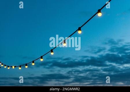 corde luci tramonto cielo. Foto ad alta risoluzione Foto Stock