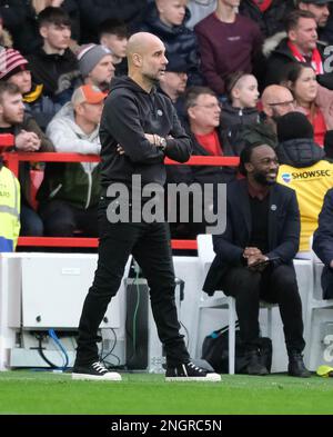 18th febbraio 2023; The City Ground, Nottingham, Inghilterra; Premier League Football, Foresta di Nottingham contro Manchester City; Manchester City Head Coach Pep Guardiola Foto Stock