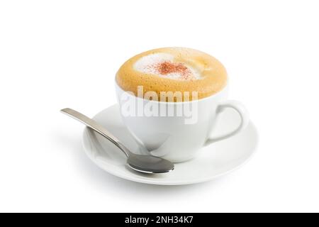 Tazza di cappuccino con cannella su fondo bianco. Foto Stock