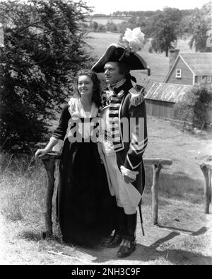 JANETTE SCOTT e LAURENCE OLIVIER sul candid set location a Tring, Hertfordshire durante le riprese del DISCEPOLO del DIAVOLO del 1959, il REGISTA HAMILTON e (non accreditato) ALEXANDER MACKENDRICK sulla base della sceneggiatura di George Bernard Shaw John Dighton e della musica di Roland Kibbee Richard Rodney Bennett, cineasta Jack Hildyard, costumi Mary Grant UK-USA, co-produttori co-esecutivi Kirk Douglas e Burt Lancaster Hecht-Hill Productions / Brynaprod / Artisti Uniti Foto Stock