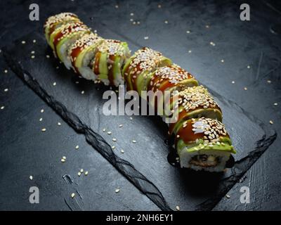 verde drago avocado sushi cibo arte giapponese pasto Foto Stock