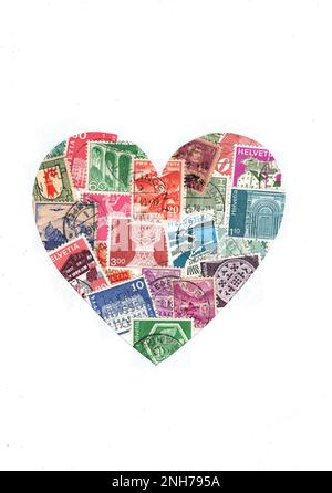 Francobolli d'epoca svizzeri a forma di cuore. Foto Stock