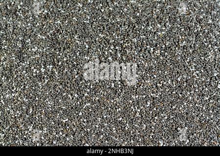 Semi di chia essiccati ad alto contenuto di fibre alimentari, vitamine, minerali, proteine, grassi e carboidrati, Ricco in vitamine di B, tiamina e niacina, it' Foto Stock