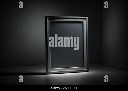Mockup di cornice nera in interni scuri Foto Stock