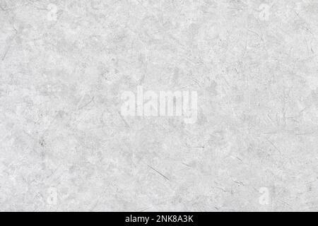 Astratto grigio chiaro intonacato sfondo grunge testurizzato in forma di ruvido muro di stucco coperto, primo piano Foto Stock