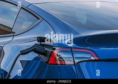Ricarica dell'auto elettrica, primo piano Foto Stock